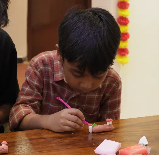 Kids enjoying clay modelling class at Lil Sculpr Chennai